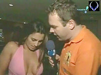 Guy is interviewing the sexy lady and talking her into showing the naked tittied upblouse.